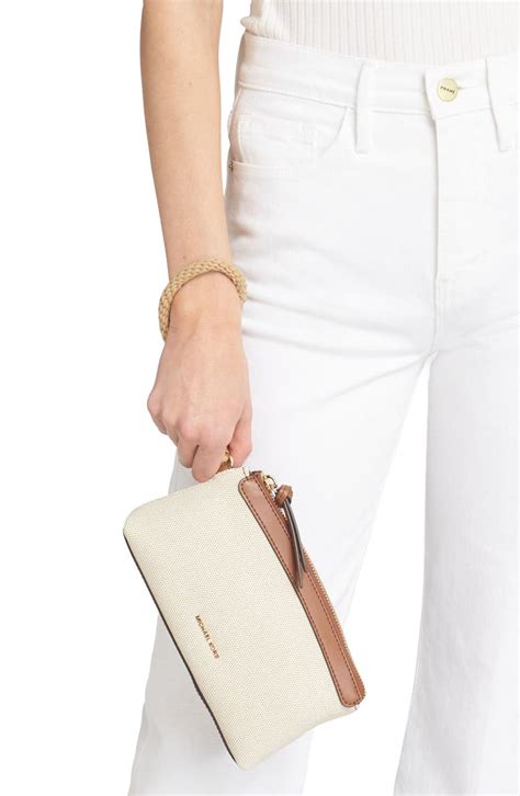 michael kors small wristlet|Michael Kors studded wristlet.